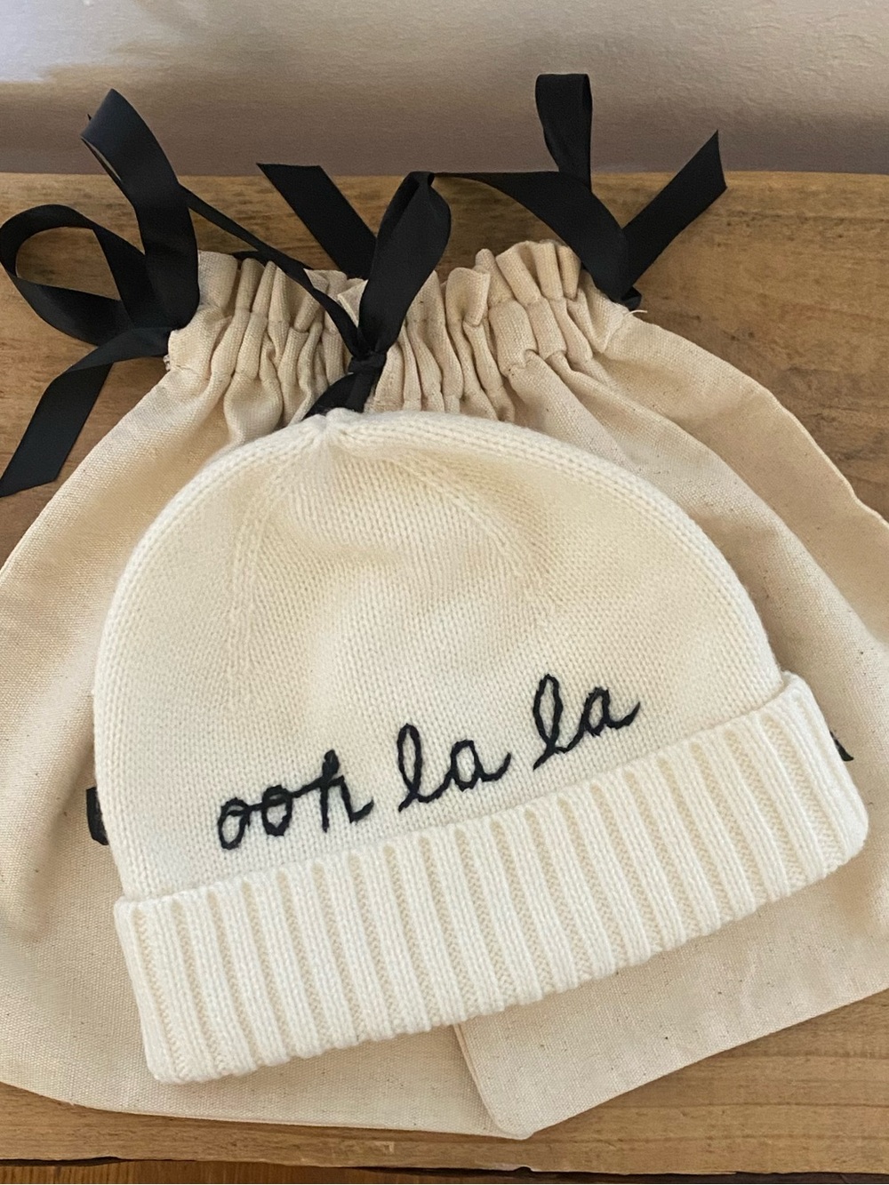kate ♠️ Spade Cream Beanie with Black "ooh la la" Embroidery - Picture 6 of 11